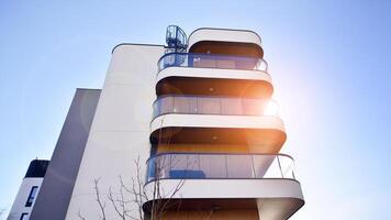 Modern architecture of urban residential apartment building. Apartment building exterior, residential house facade. photo