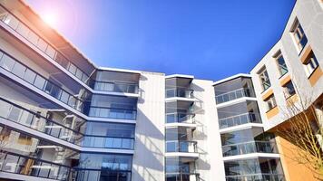 Modern architecture of urban residential apartment building. Apartment building exterior, residential house facade. photo