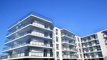 Modern architecture of urban residential apartment building. Apartment building exterior, residential house facade. photo