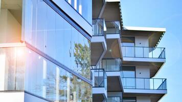 Modern architecture of urban residential apartment building. Apartment building exterior, residential house facade. photo