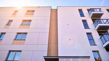 Modern architecture of urban residential apartment building. Apartment building exterior, residential house facade. photo