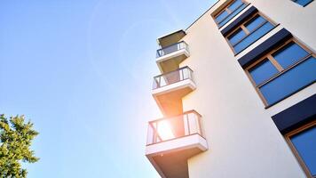 Modern architecture of urban residential apartment building. Apartment building exterior, residential house facade. photo