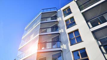 Modern architecture of urban residential apartment building. Apartment building exterior, residential house facade. photo