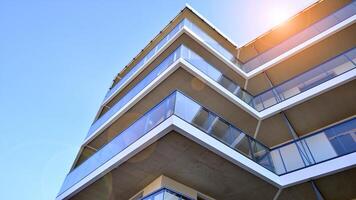 Modern architecture of urban residential apartment building. Apartment building exterior, residential house facade. photo