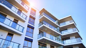 Modern architecture of urban residential apartment building. Apartment building exterior, residential house facade. photo