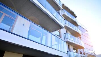 Modern architecture of urban residential apartment building. Apartment building exterior, residential house facade. photo