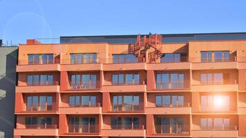 Modern architecture of urban residential apartment building. Apartment building exterior, residential house facade. photo