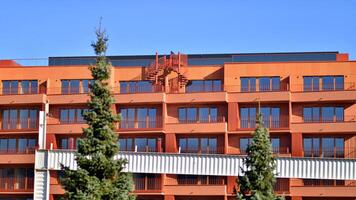 Modern architecture of urban residential apartment building. Apartment building exterior, residential house facade. photo