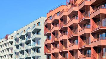 Modern architecture of urban residential apartment building. Apartment building exterior, residential house facade. photo