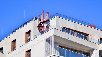 Modern architecture of urban residential apartment building. Apartment building exterior, residential house facade. photo