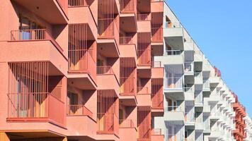 Modern architecture of urban residential apartment building. Apartment building exterior, residential house facade. photo