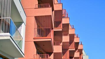 Modern architecture of urban residential apartment building. Apartment building exterior, residential house facade. photo