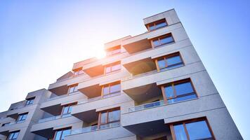 Modern architecture of urban residential apartment building. Apartment building exterior, residential house facade. photo