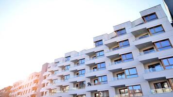 Modern architecture of urban residential apartment building. Apartment building exterior, residential house facade. photo