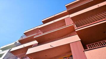 Modern architecture of urban residential apartment building. Apartment building exterior, residential house facade. photo