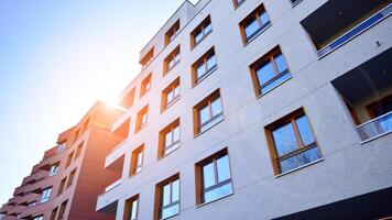 Modern architecture of urban residential apartment building. Apartment building exterior, residential house facade. photo