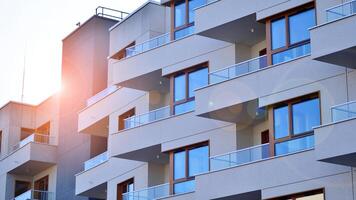 Modern architecture of urban residential apartment building. Apartment building exterior, residential house facade. photo