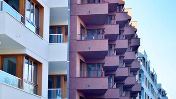 Modern architecture of urban residential apartment building. Apartment building exterior, residential house facade. photo