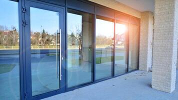 Panoramic windows of new commercial premises. Commercial property in development standard for rent. photo