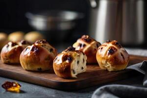 hot cross buns on a black background photo