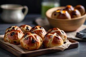 hot cross buns on a black background photo