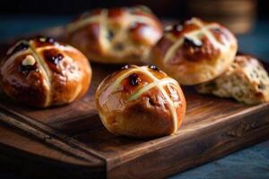 hot cross buns on a black background photo