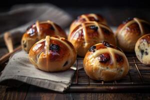 hot cross buns on a black background photo