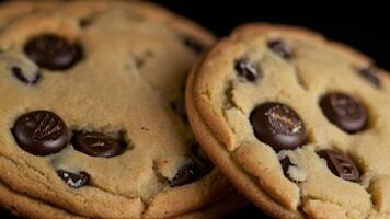 a stack of chocolate chip cookies with chocolate chips photo