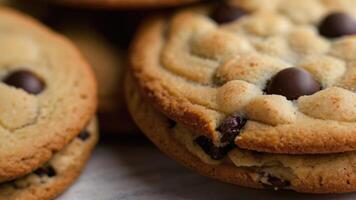 a stack of chocolate chip cookies with chocolate chips photo