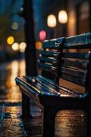 un banco es sentado en el lluvia a noche foto