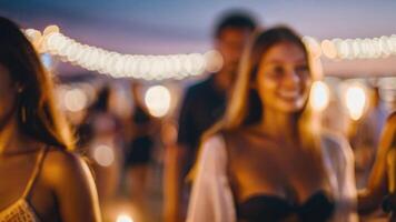 Defocused People is having a beach party at night in the summer event festival vacation on a blurred background photo