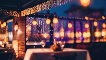 DDefocused restaurant with outdoor string lights on a blurred background photo