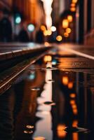 a street at night with lights and reflections photo