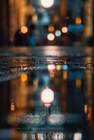 a street at night with lights and reflections photo