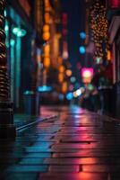 a blurry image of a street at night photo