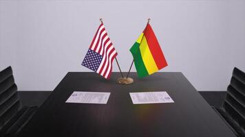 bolivia y Estados Unidos a negociando mesa. negocio y política 3d ilustración. nacional banderas, diplomacia trato. internacional acuerdo foto