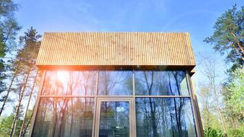 New single family house. Residential home with modern wooden facade. photo