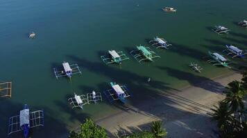 asia Fishing boats near the shore in morning sun light video