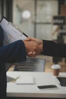 Business handshake for teamwork of business merger and acquisition,successful negotiate,hand shake,two businessman shake hand with partner to celebration partnership and business deal concept photo