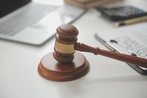 Lawyer, legal advisor, businessman brainstorming information on agreement details Business contracts in legal processing books for accuracy in contract documents. joint financial investment. photo