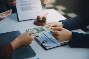 Businessman and lawyer discuss the contract document. Treaty of the law. Sign a contract business. photo