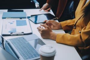 Financial Business team present. Business man hands hold documents with financial statistic stock photo, discussion, and analysis report data the charts and graphs. Finance Financial concept photo