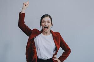 Happy young businesswoman on white background photo