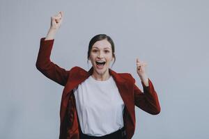 Happy young businesswoman on white background photo