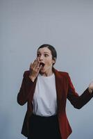 Happy young businesswoman on white background photo