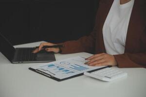 Business Documents, Auditor businesswoman checking searching document legal prepare paperwork or report for analysis TAX time,accountant Documents data contract partner deal in workplace office photo