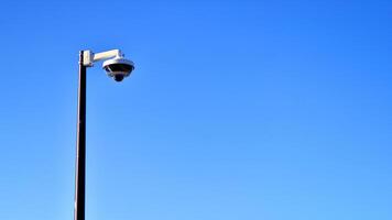 Surveillance camera on the mast photo