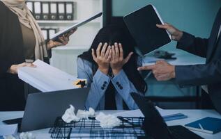 Stressful business man have so many paperwork in the office photo