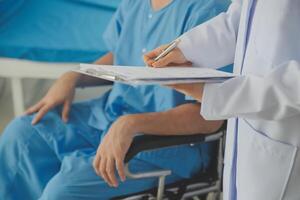 Female doctors who treat patients make an appointment to listen to the results after a physical examination and explain medical information and diagnose the disease. Medical concepts and good healt. photo