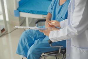 Female doctors who treat patients make an appointment to listen to the results after a physical examination and explain medical information and diagnose the disease. Medical concepts and good healt. photo